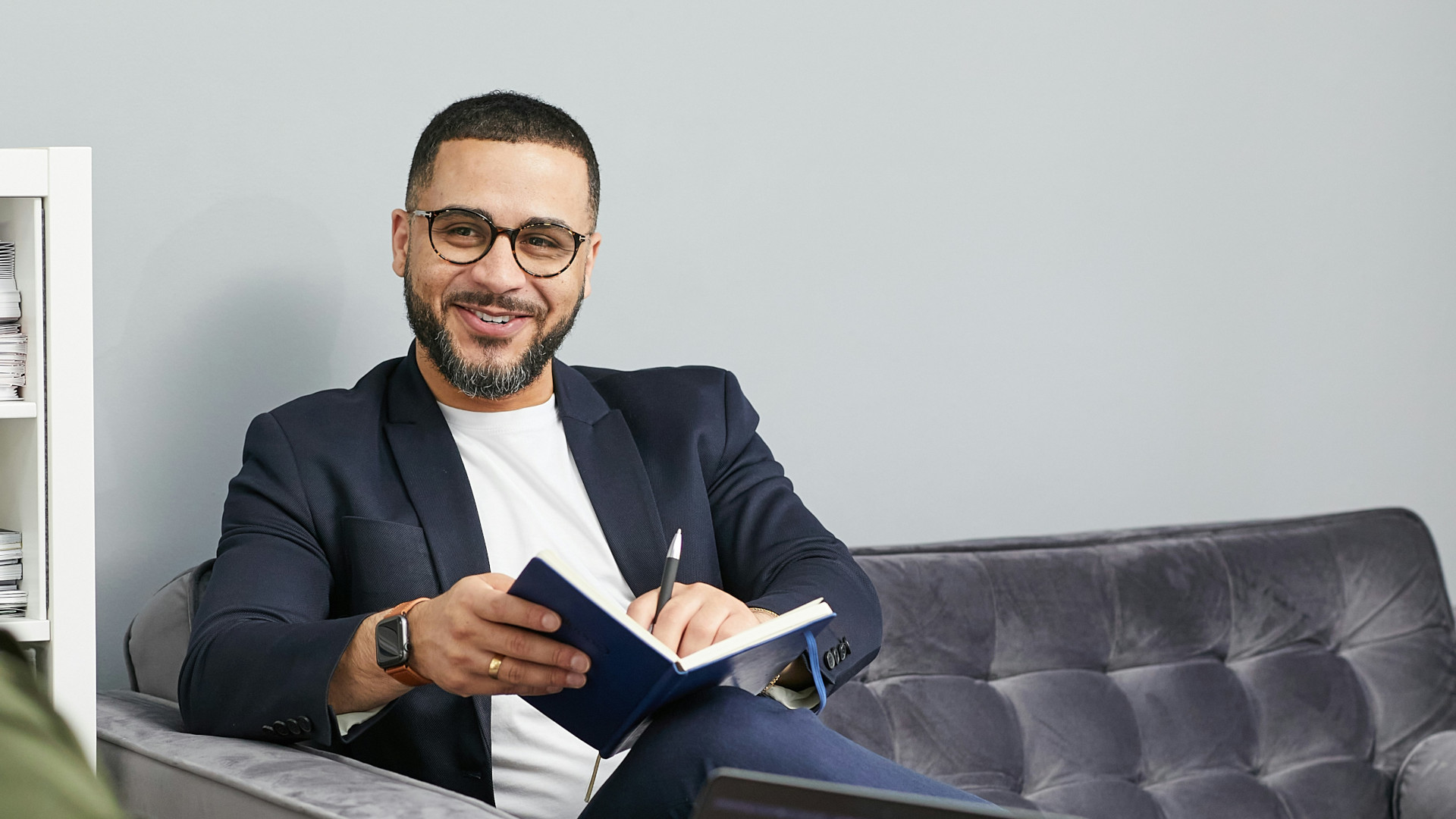 A professional man engaged in an English coaching lesson.