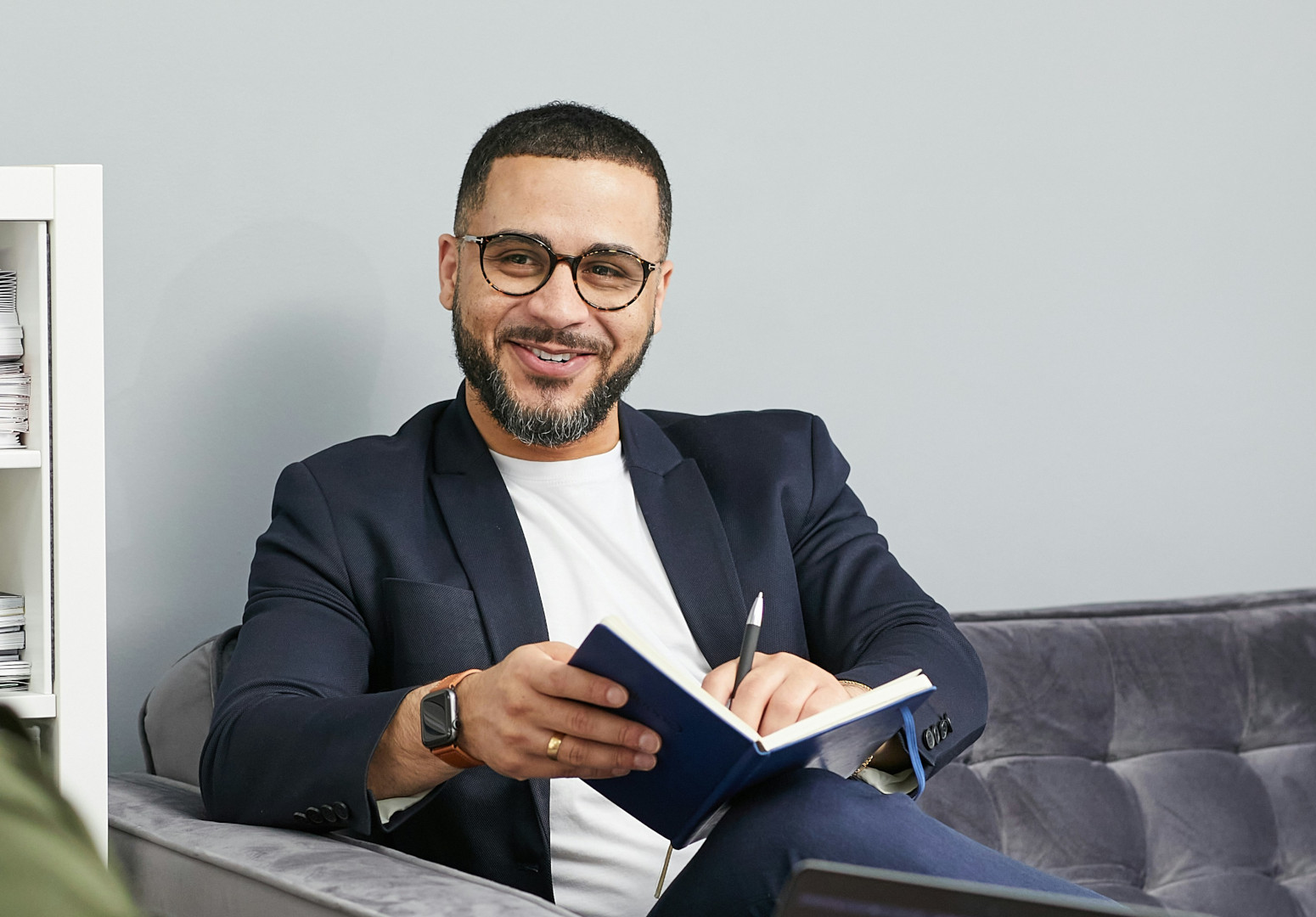 A professional man engaged in an English coaching lesson.